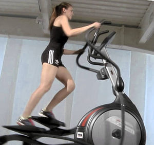 Elliptical cross trainer in use